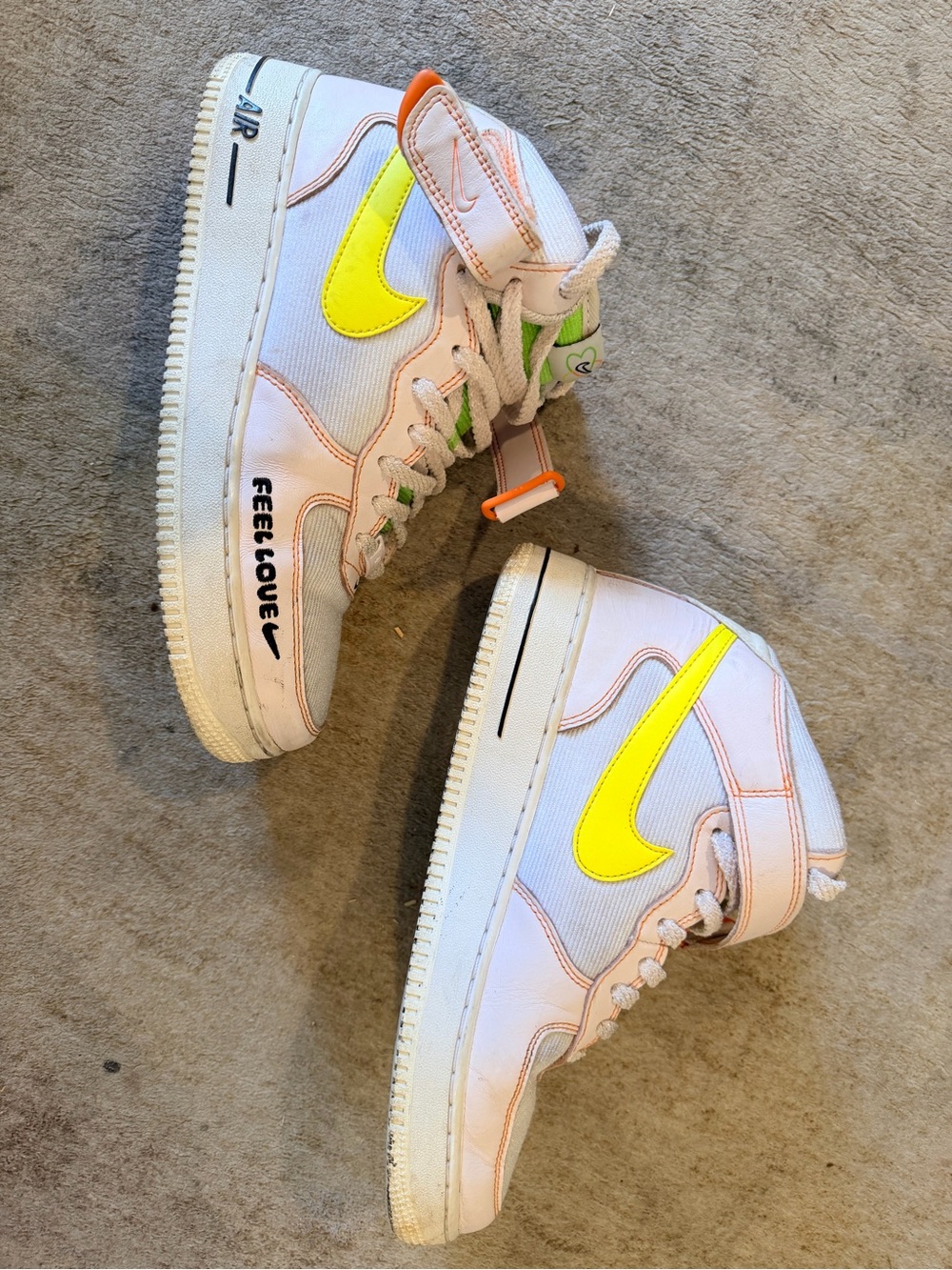 White High-Top Nike Sneakers with Neon Yellow Swoosh